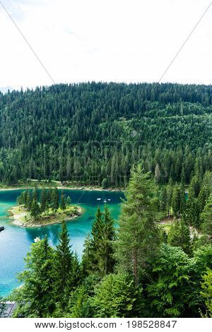 Caumasee in Switzerland lake with turquoise water for hiking and swimming