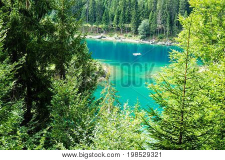 Caumasee in Switzerland lake with turquoise water for hiking and swimming