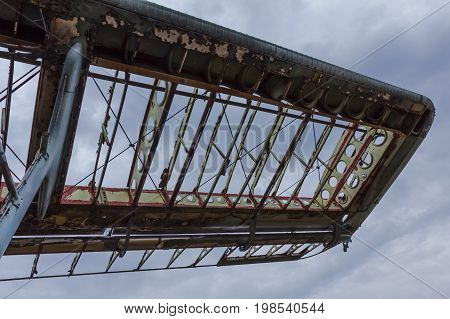 Broken broken wings of the old biplane abandoned aircraft
