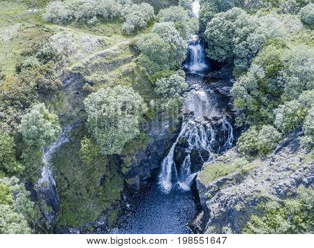 Aerial of the beautiful Lealt Falls - Isle of Skye - Scotland, United Kingdome