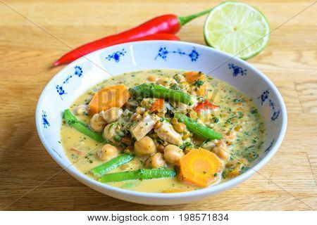 Stew or soup with healthy vegetables like chili beans carrots and lentils