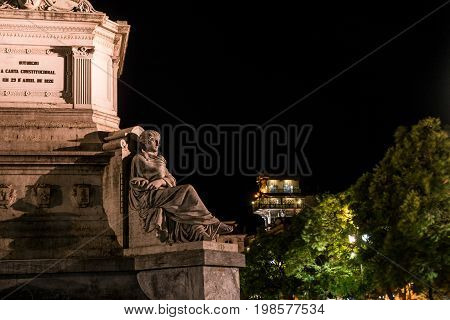 Column of Pedro IV on Rossio Square, Pedro IV Square, Praca de D. Pedro IV in the city of Lisbon at night, in Portugal