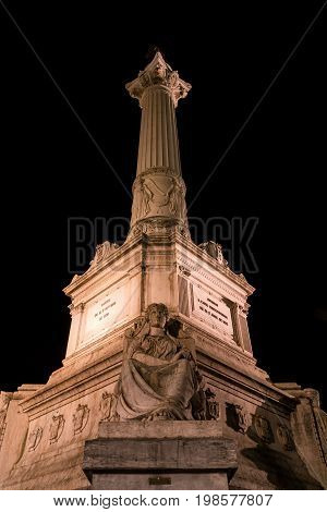 Column of Pedro IV on Rossio Square, Pedro IV Square, Praca de D. Pedro IV in the city of Lisbon at night, in Portugal
