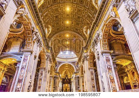 ROME, iTALY - JANUARY 8, 2017 Saint Peter's Basilica Nave Bernini Baldacchino Holy Spirit Dove Vatican Rome Italy. Baldacchino Canopy built in 1600s over altar and St. Peter's tomb