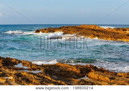 Landscape Of Beautiful Coast During Sunset Near Malia, Crete,  Greece