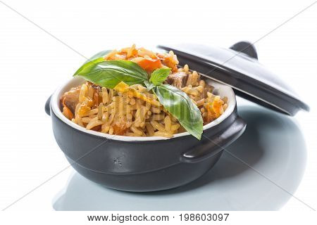 Pilaf with beef, carrots, onions, garlic, pepper and cumin. A traditional dish of Asian cuisine.