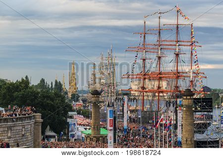 SZCZECIN, WEST POMERANIAN / POLAND - 2017: Final Tall Ships Races. Sailing ships at the waterfront and thousands of people at the concert
