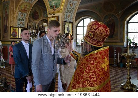 Alchevsk, Ukraine - April 28, 2017: Wedding Ceremony For Newlyweds In The Church