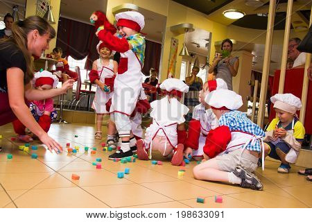 Alchevsk, Ukraine - July 23, 2017: School Cook For Children. Active Games With Children In The Form