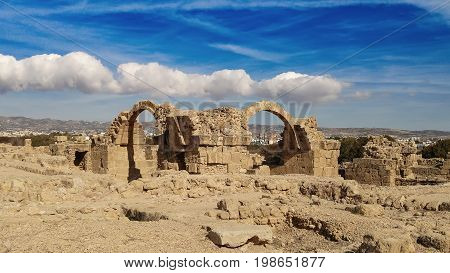 Ancient ruins of Kourion city near Pathos and Limassol, Cyprus. Santa Colones Castle ruins with blue sky. Travel outdoor background