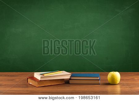 Back to school concepty with clear blackboard background, desk, items