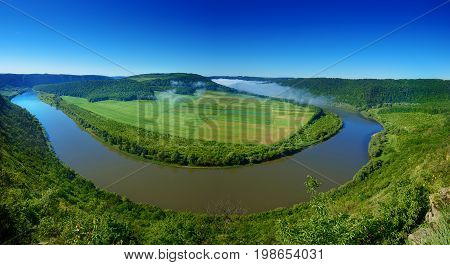 Dnister river landscape in Ternopil region of western Ukraine. Idillyc view from above in the morning. Panorama