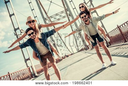 Young People Walking Outdoors