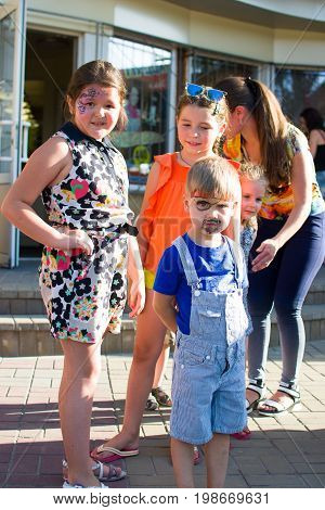 Alchevsk, Ukraine - July 27, 2017: Happy Children Play With Animators In Summer