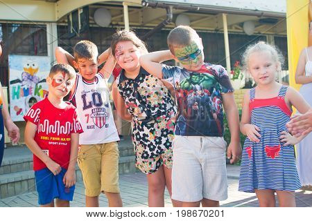 Alchevsk, Ukraine - July 27, 2017: Happy Children Play With Animators In Summer