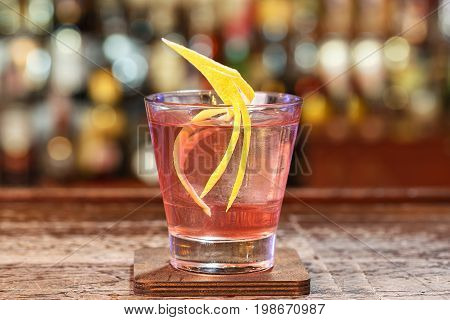 Cocktail knickerbocker recipe - white rum with raspberry liqueur lime juice mixed in a shaker. Space for text