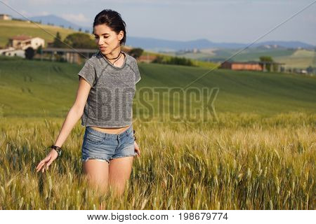 Happy beautiful woman in meadow. Freedom concept background.
