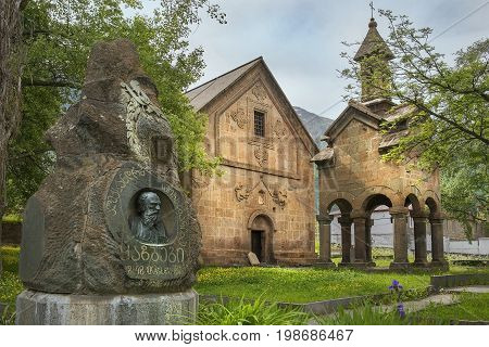 Village of Stepantsminda, Georgia - 2017 June 16: monument on the grave of Alexander Kazbegi and Stepantsminda historical museum, located in Khevi in the childhood home of writer Alexander Kazbegi