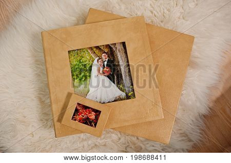 Elegant Orange Brown Photobook Or Photo Album On The Sofa.