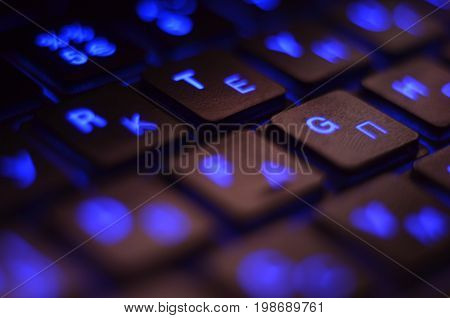 Close Up. Blue Backlight, Backlit On Laptop Or Keyborad Computer Of Gaming In The Dark. Computer Lap
