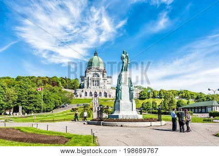 Montreal Canada - May 28 2017: St Joseph's Oratory on Mont Royal with statue in Quebec region city and group of people