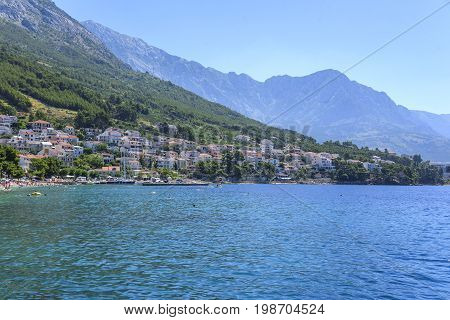 BRELA, CROATIA - 6 JULY, 2017: View of the coastline of the beaches in the resort town of Brela in Croatia.
