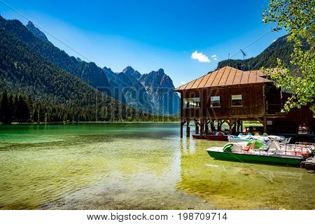 Lake Dobbiaco in the Dolomites, Beautiful Nature Italy natural landscape Alps.