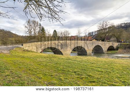 historic stone bridge at a small rural village named Oberregenbach near Langenburg in Hohenlohe a area in Southern Germany
