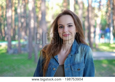 Beautiful woman in the park. Outdoor portrait