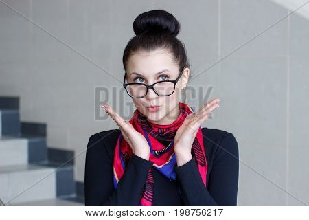 Portrait of a beautiful brunette women with a surprised look