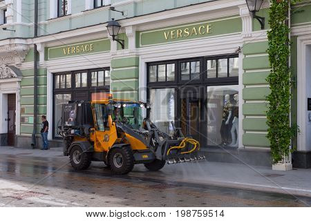 MOSCOW - AUGUST 7: Watering machine in Stoleshnikov Lane on August 7 2017 in Moscow. Stoleshnikov lane is pedestrian street in the center of Moscow.