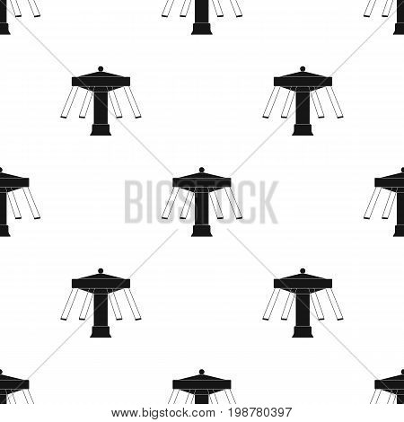 Carousel with seats on chains for children. Amusement park.Amusement park single icon in black style vector symbol stock web illustration.