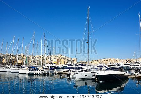 VITTORIOSA, MALTA - MARCH 31, 2017 - View of Vittoriosa and Senglea marina with Senglea waterfront buildings to the rear Vittoriosa (Birgu) Malta Europe, March 31, 2017.