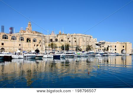 VITTORIOSA, MALTA - MARCH 31, 2017 - View of Vittoriosa and Senglea marina with Senglea waterfront buildings to the rear Vittoriosa (Birgu) Malta Europe, March 31, 2017.