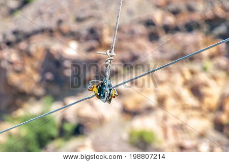 Equipment for safe trolling on a steel cable. Zipline.