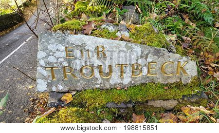 sign of the town troutbeck made of stone