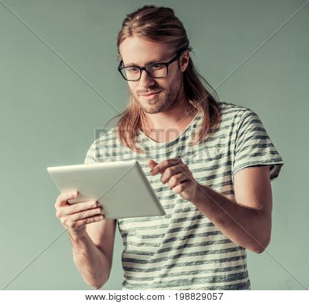 Young Man With Gadget