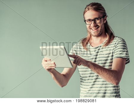 Young Man With Gadget