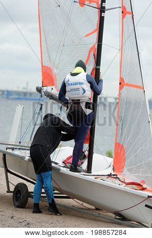 ST. PETERSBURG, RUSSIA - JULY 5, 2017: Training in sailing on 29er dinghy in the Gulf of Finland near the yacht club of St. Petersburg. Yacht club organizes sailing classes and holds sports regattas