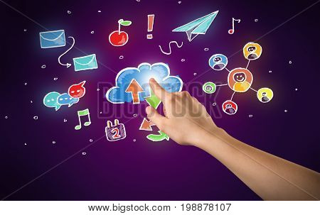 Female hand toucing mixed media icons with purple background