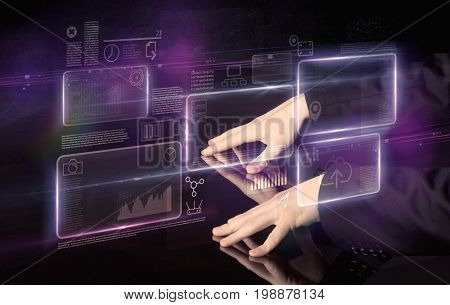 Male hands touching interactive table with purple cloudspace graphic on it 