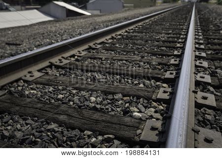 Angled shot of old wooden railroad tracks