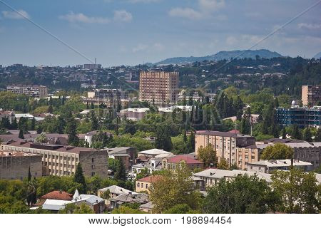 Day aerial cityscape of Sukhum downtown, view to Abkhazia Council of Ministers building