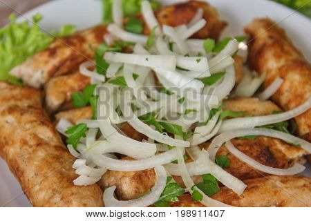 Luleh Kebab, Traditional Ethnic Meat Dish, With Onion And Grocery