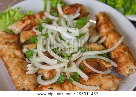 Luleh Kebab, Traditional Ethnic Meat Dish, With Onion And Grocery