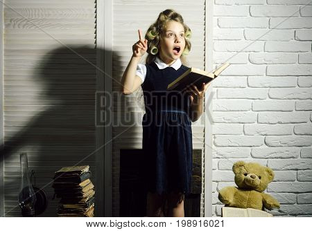 Child With Briefcase And Typewriter On Table.
