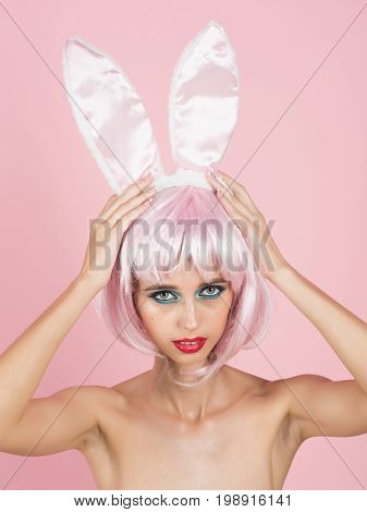 Woman In Pink Wig With Fashionable Makeup.