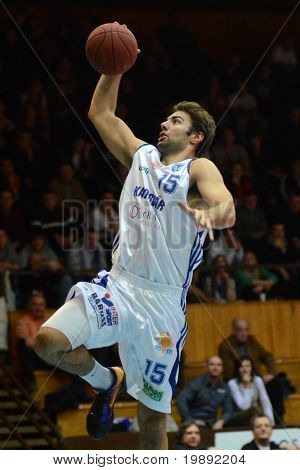 KAPOSVAR, HUNGARY - DECEMBER 11: Dan Werner (15) in action at a Hungarian Championship basketball game Kaposvar vs. Salgotarjan December 11, 2010 in Kaposvar, Hungary.