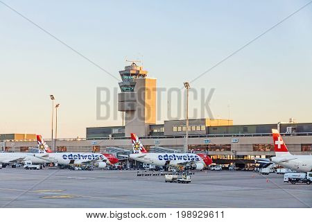 Zurich Switzerland - June 11 2017: Airport Zurich (Flughafen Zurich) - view of Tower and airfield with several airbus of airline 