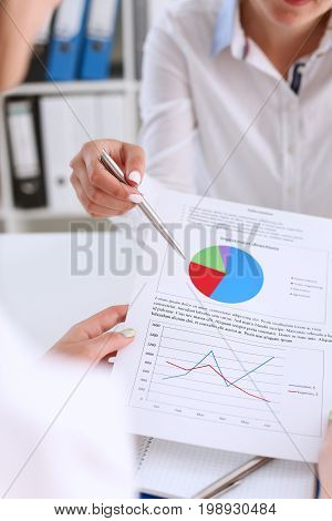 Businesswoman Holding A Silver Pen In Her Hand